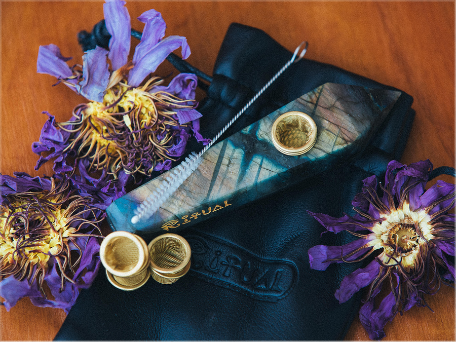 Labradorite pipe among Blue Lotus flowers