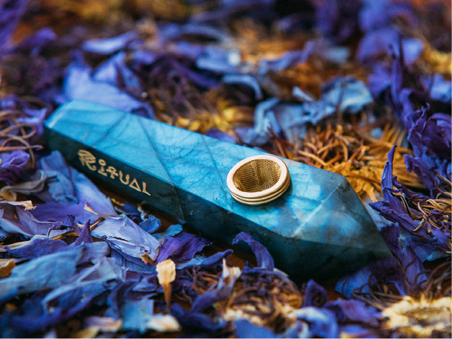 Labradorite pipe held in the hand